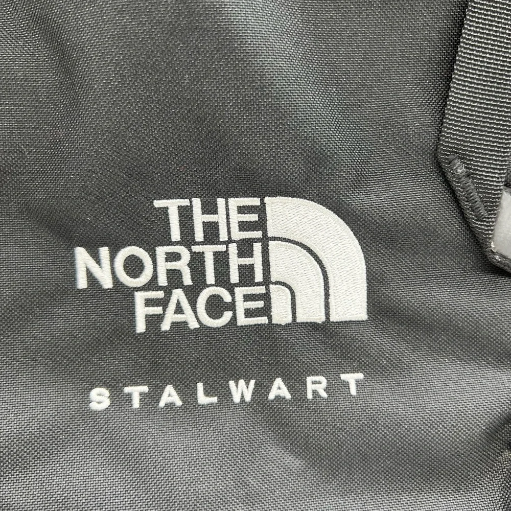 The North Face black large features